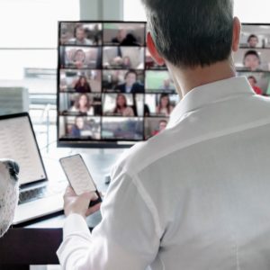 man working remotely multitasking video chatting 2021 08 29 15 41 56 utc